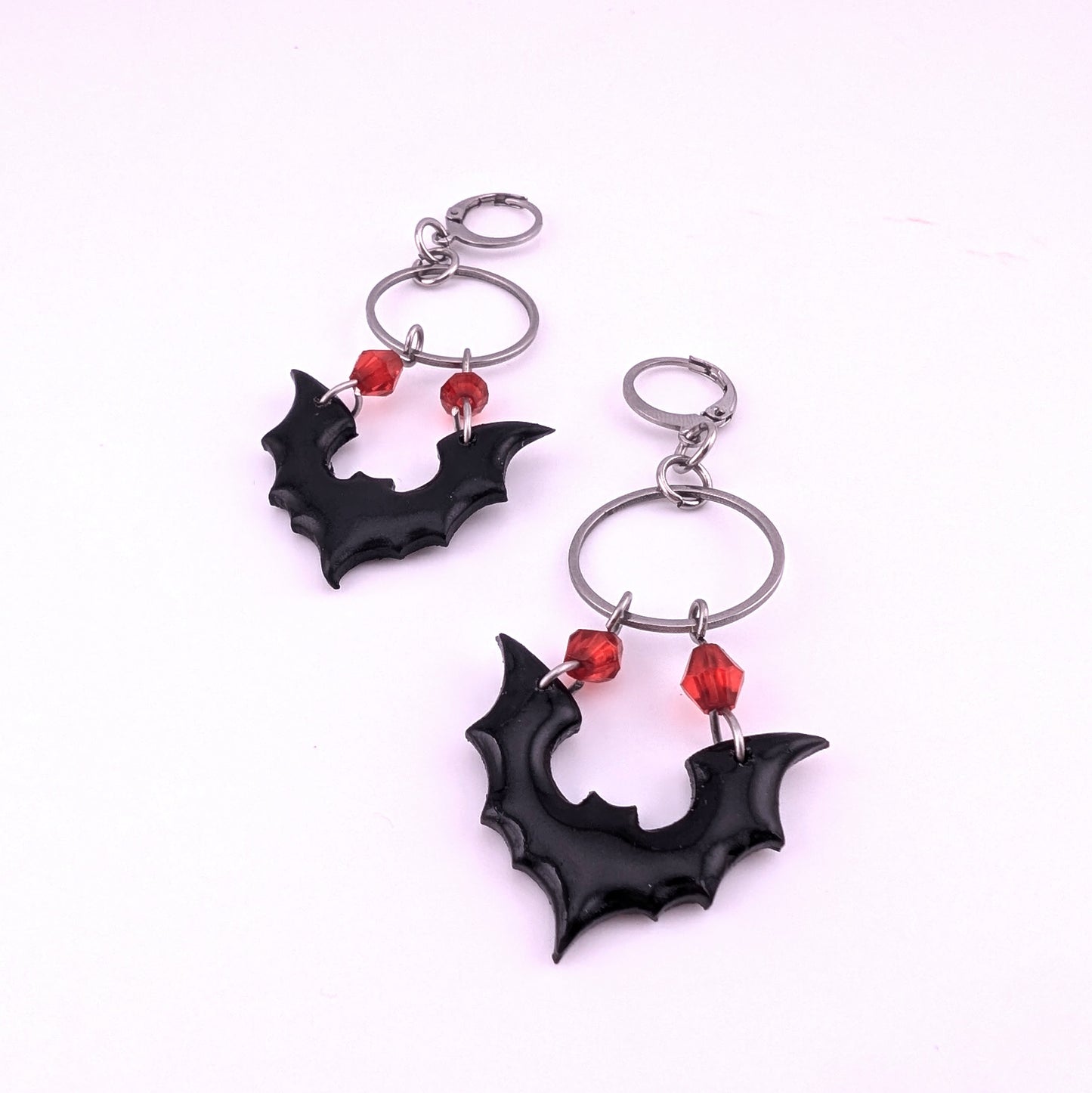 Gothic Dangle Black Bat Earrings | Red Crystal Accents